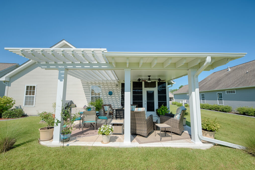 Innovative pergola with a retractable canopy, allowing for adjustable shade and weather protection, set in a contemporary backyard.