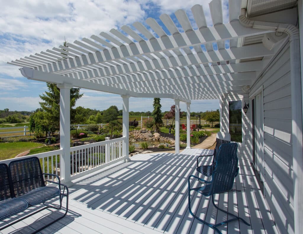 Attached pergolas can blend in with the architecture of your home and extend your outdoor living area.