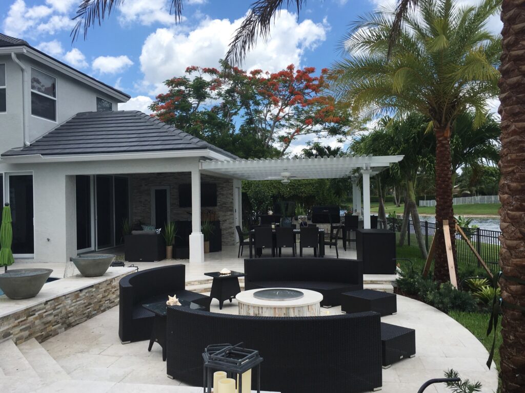 Attached pergolas can blend in with the architecture of your home and extend your outdoor living area.