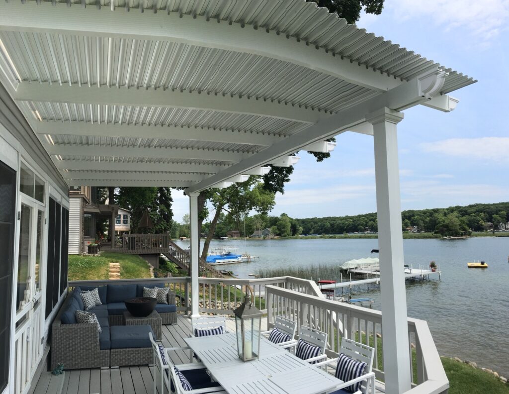 Attached pergolas can blend in with the architecture of your home and extend your outdoor living area.