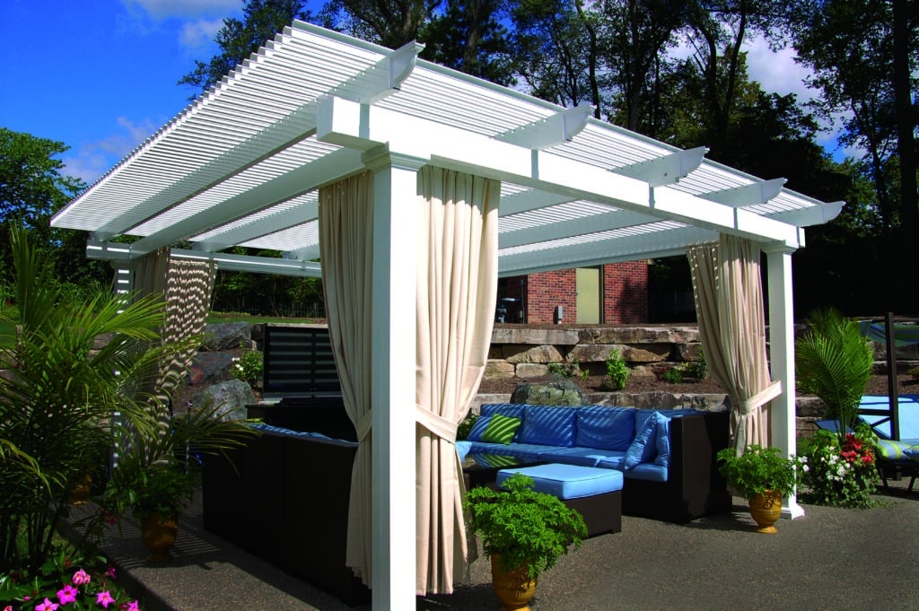 Pergolas can enhance your backyard by adding a bit of shade and protection to your backyard.