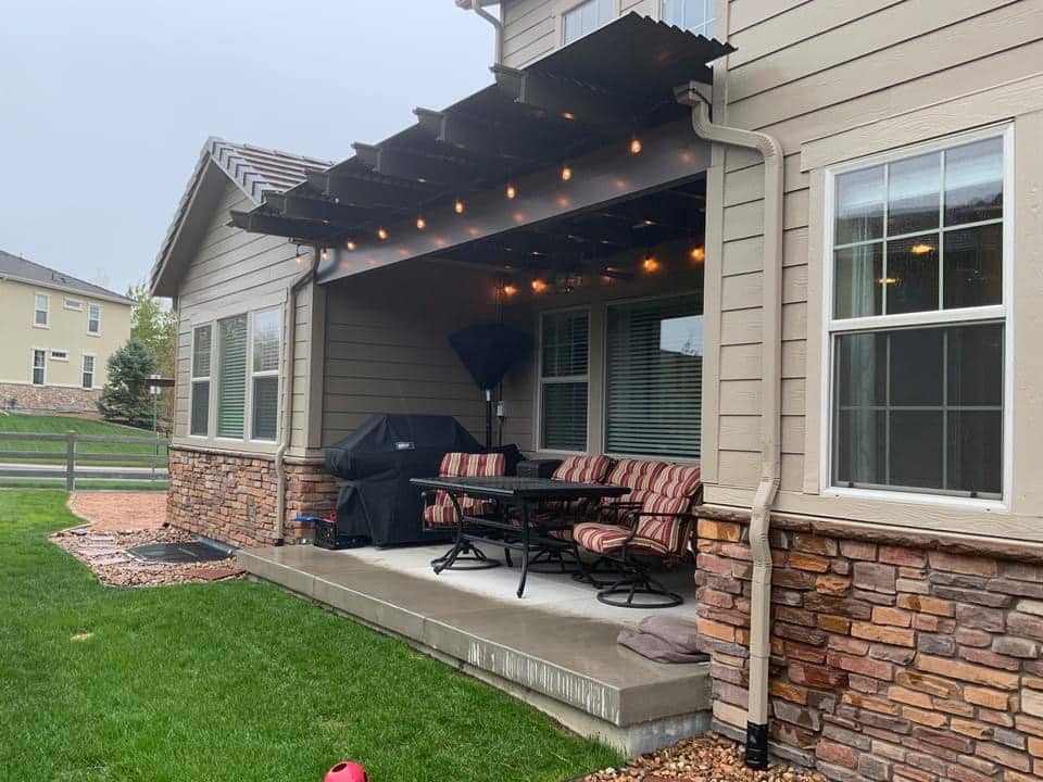 Attached pergolas can blend in with the architecture of your home and extend your outdoor living area.
