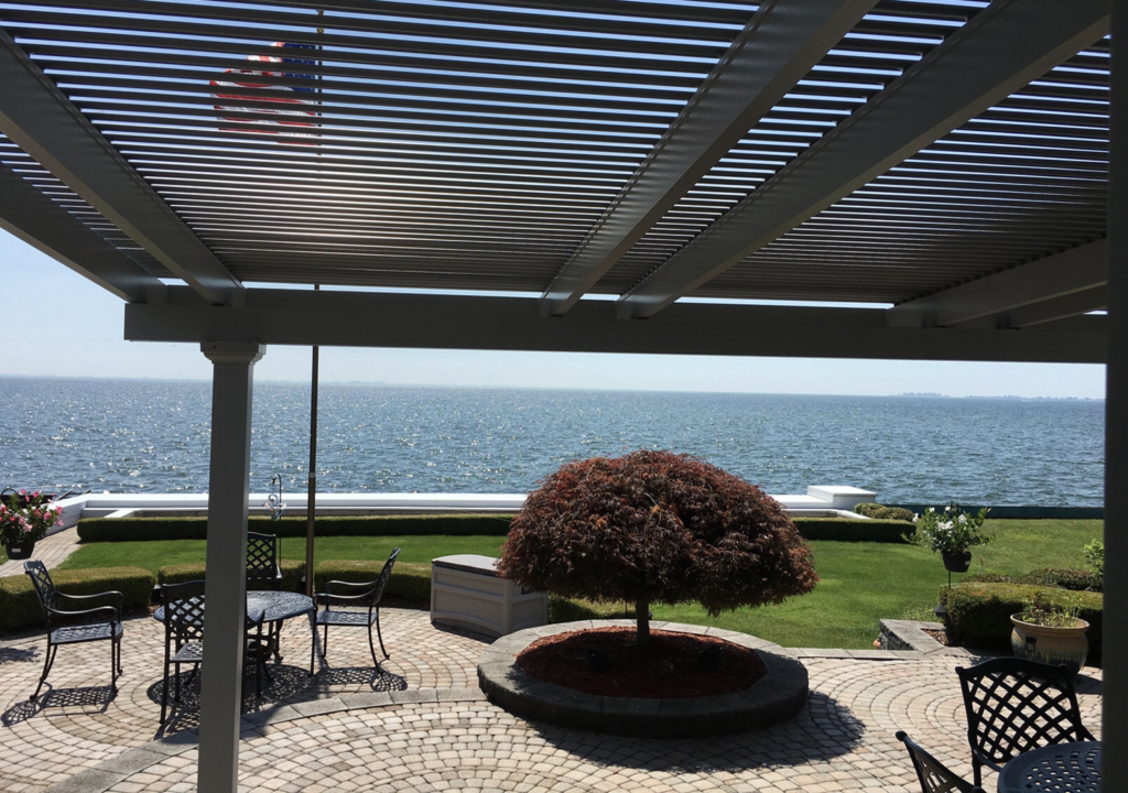 A pergola can enhance your backyard by increasing the amount of shaded area available